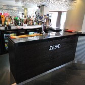 New bar installation with Versital solid surface top in 'Black Jaq'.