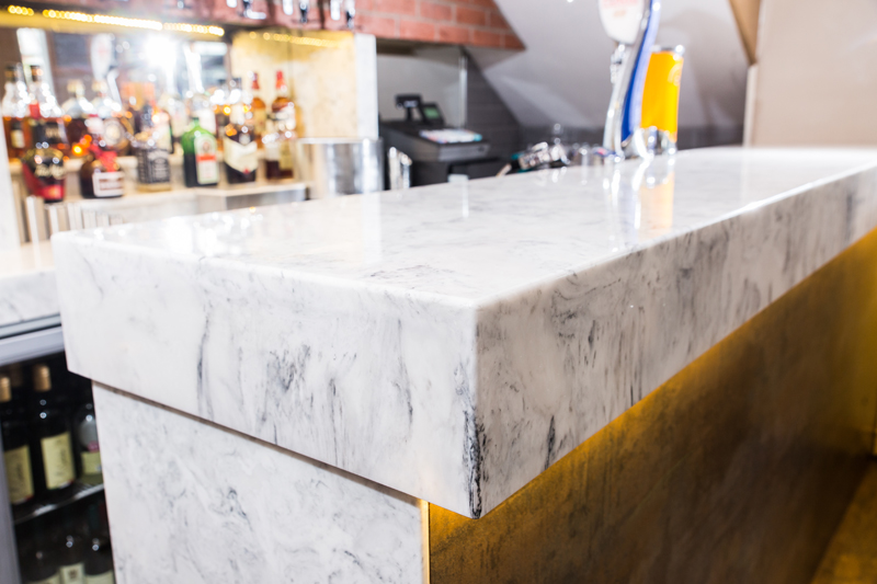 Marble bar top with LED underlighting.