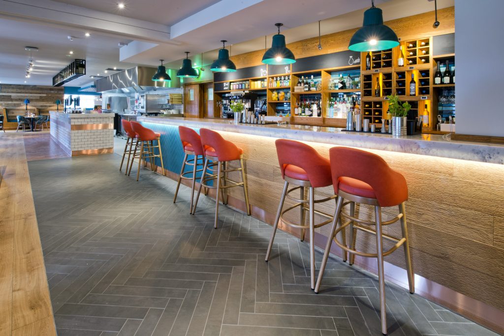 Whitbread latest brand roll out Cookhouse & Pub featuring marble bar tops from Versital