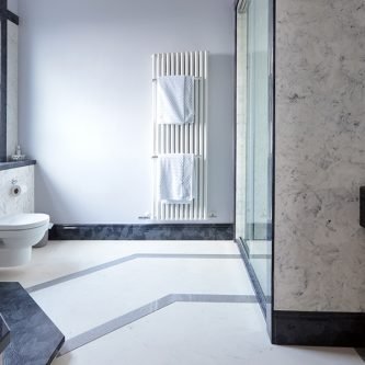Bath Deck Skirting and Floor Slabs in Glouchester Marble Finish and Wall Panels Splashback and Floor Slabs in Arabesque Marble Finish 1 333x333 1