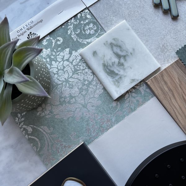 Soft green scheme with silver accents and Omexco wall paper. Versital marble in Morning Dew
