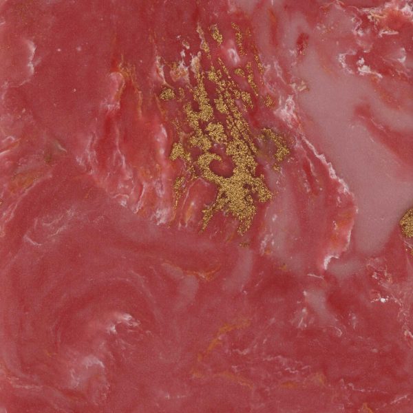 Salmon pink marble with swirls of metallic gold vein