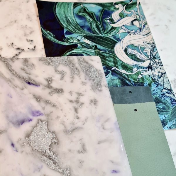 White marble with purple and silver vein with rich green sea themed paper
