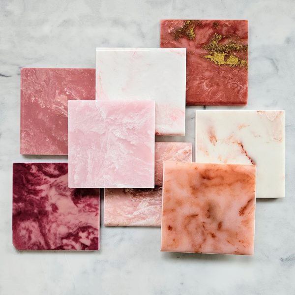 Pink and red cultured marble range of finishes from Versital. Exclusive finishes