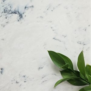 Cumulus - soft off white marble finish with black and grey veins. Cultured marble finish from the Versital ECO range from 100% recycled resin