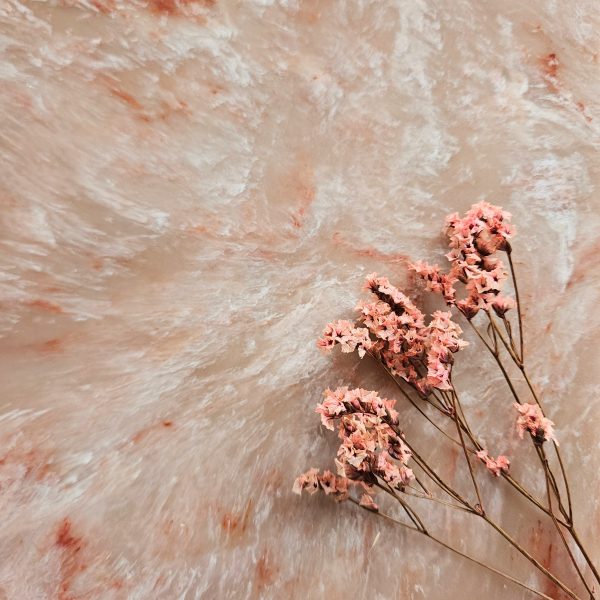 Rosewood Mist - nude and pink marble with swirls of white and brick red veins. Part of the Versital Eco range.